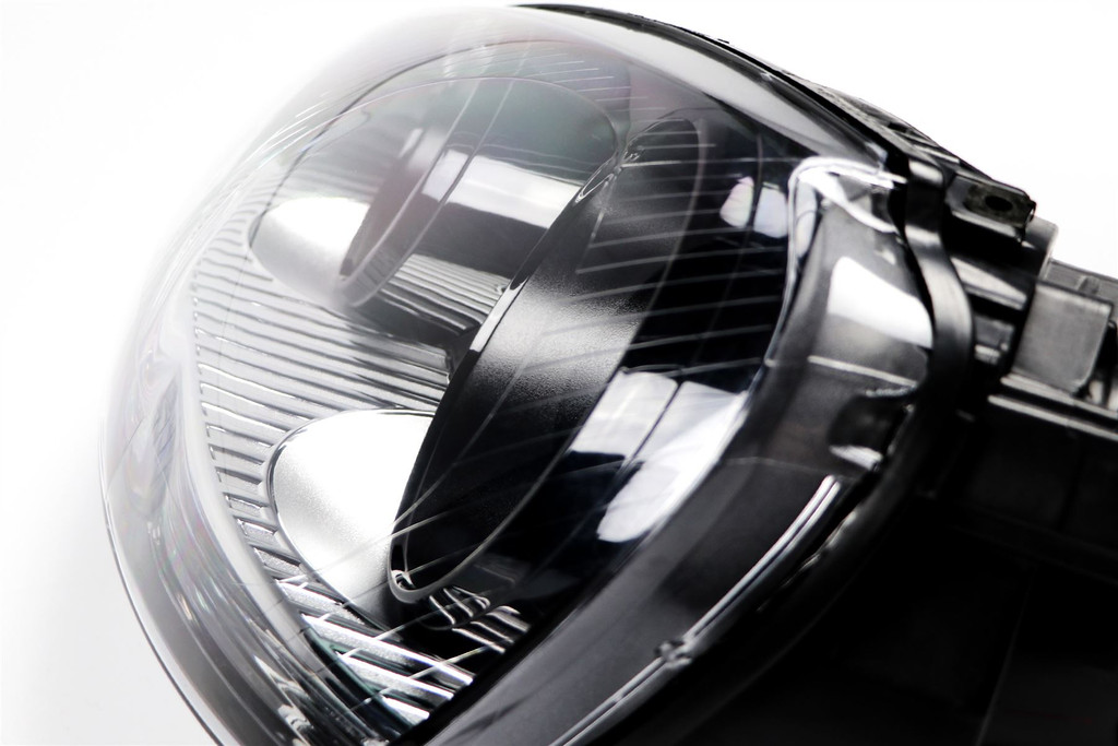 Headlight left black VW Golf MK5 03-07