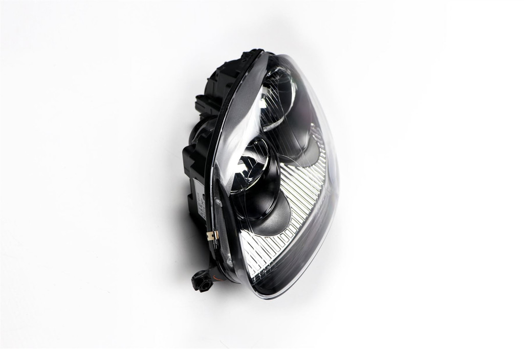 Headlight left black VW Golf MK5 03-07