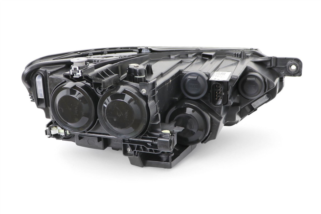 Headlight left halogen VW Passat 15- OEM Valeo