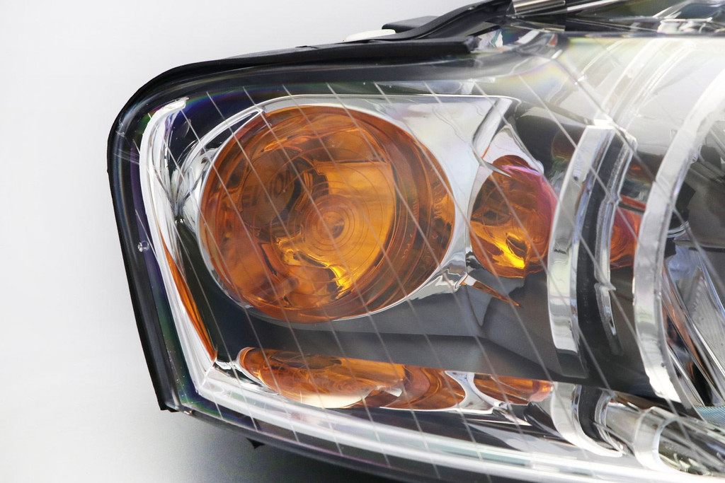 Headlight right chrome with orange indicator Audi A4 B7 04-07