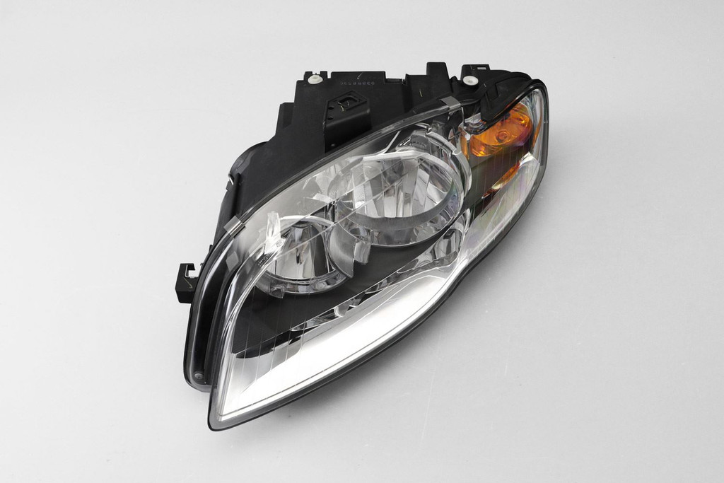 Headlight left chrome with orange indicator Audi A4 B7 04-07