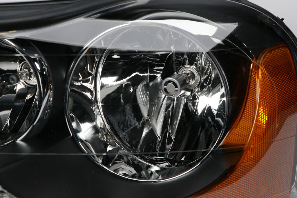 Headlight left Volvo XC90 02-07