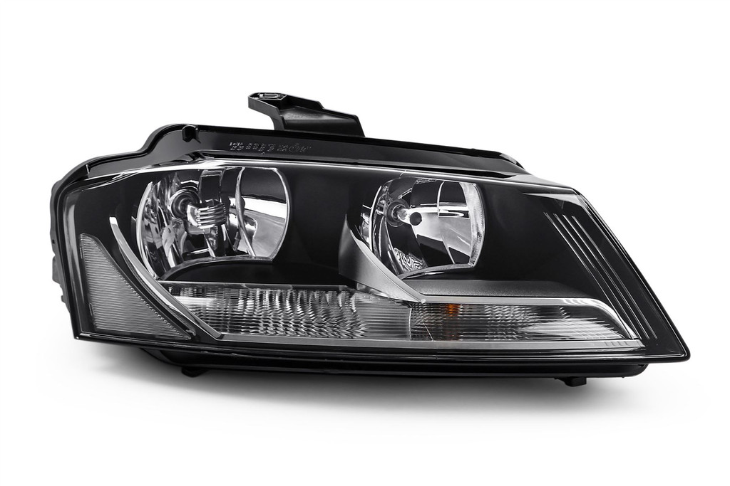 Headlight right black Hella Audi A3 08-12