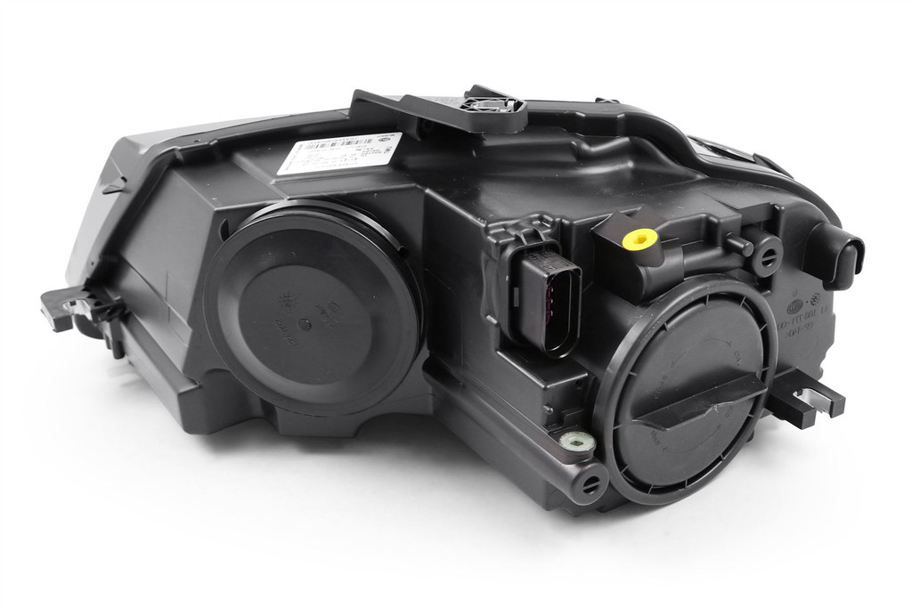 Headlight right black Hella Audi A3 08-12