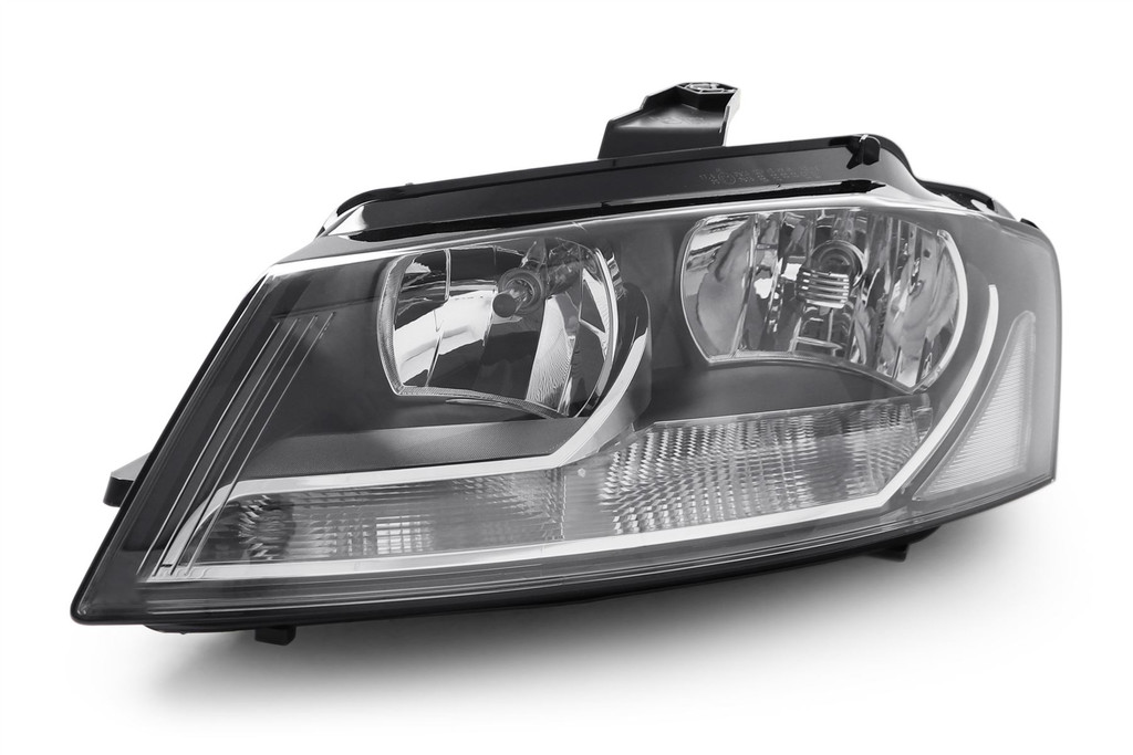 Headlight left black Hella Audi A3 08-12