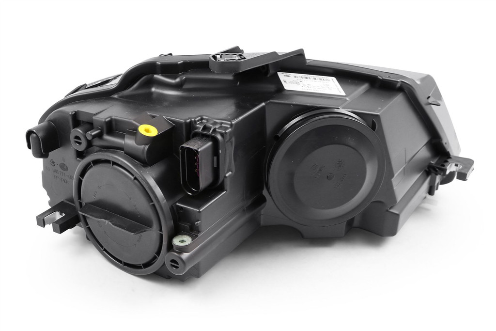 Headlight left black Hella Audi A3 08-12