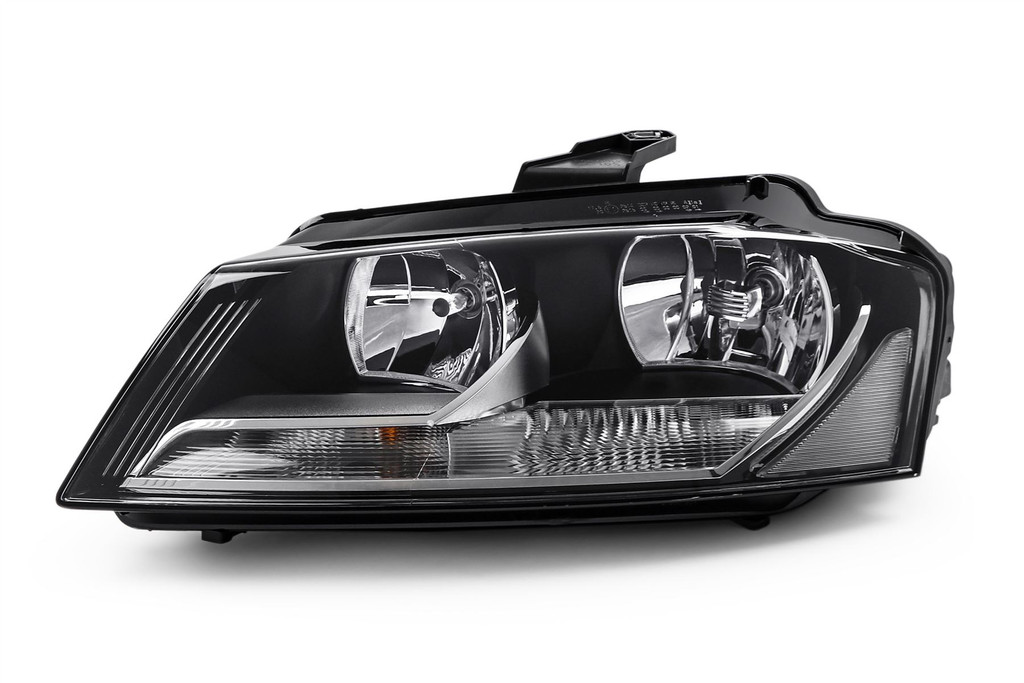 Headlight left black Hella Audi A3 08-12