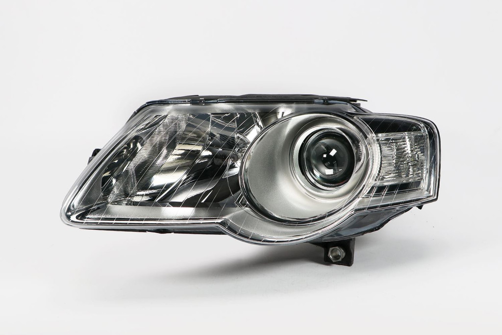 Headlight left chrome VW Passat 3C 05-10 Valeo