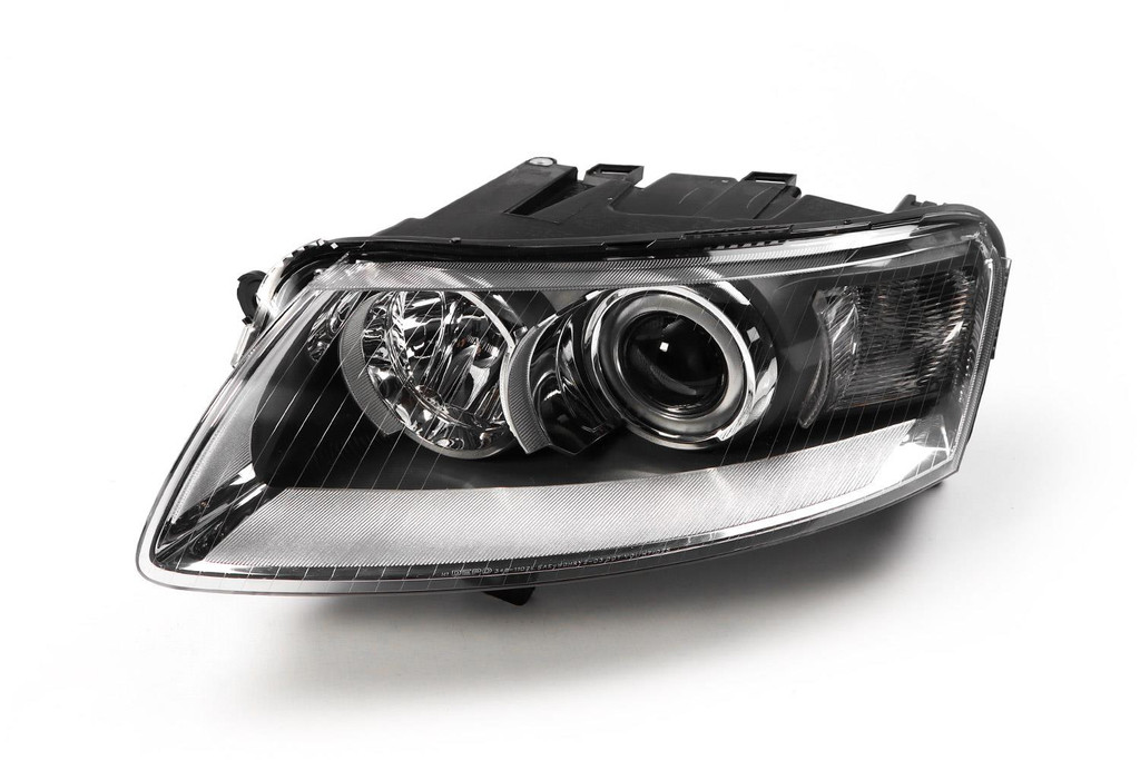 Headlight left xenon Audi A6 04-08