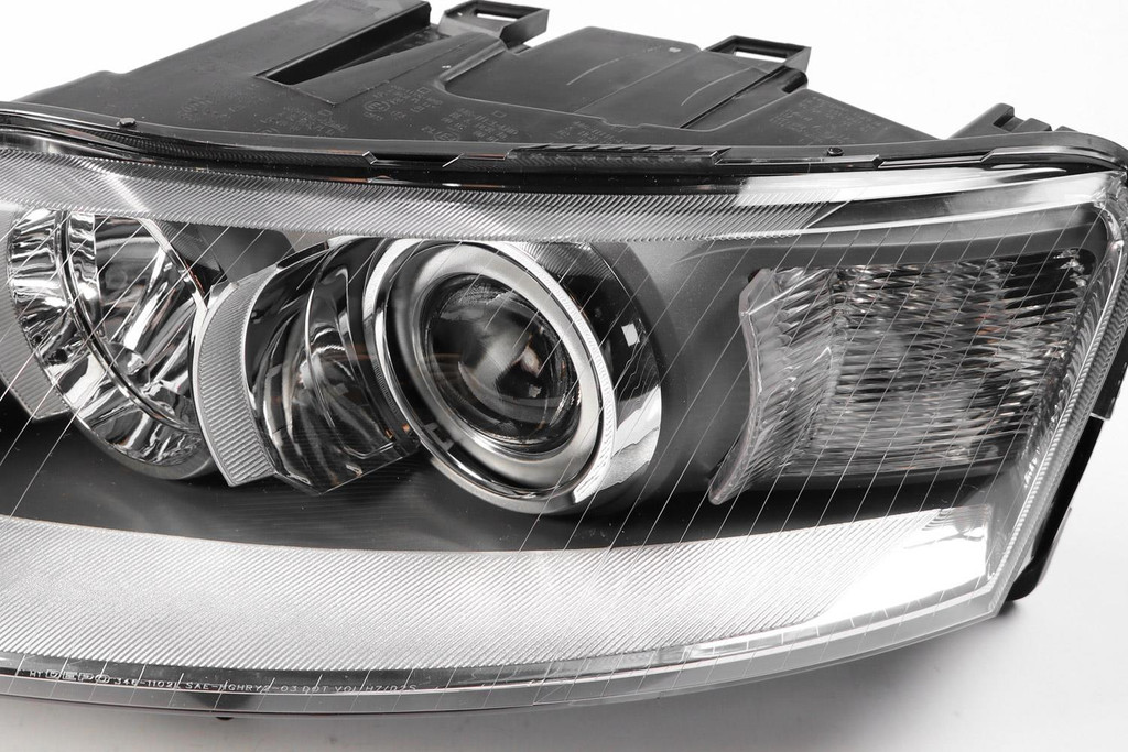 Headlight left xenon Audi A6 04-08