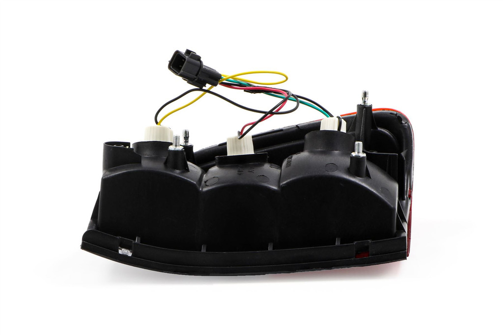 Rear light left Mitsubishi L200 96-06