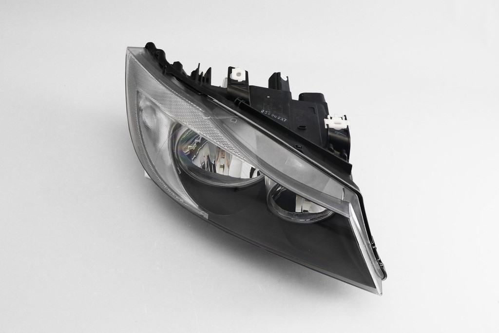 Headlight black inner right BMW 3 Series E90 E91 05-08