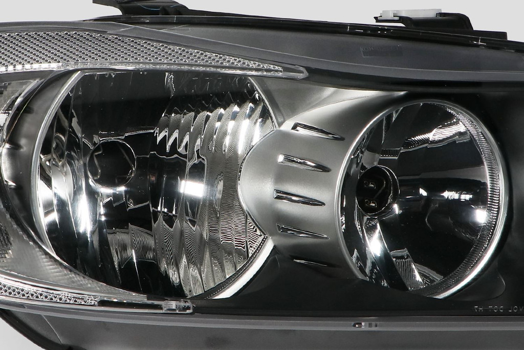 Headlight black inner right BMW 3 Series E90 E91 05-08