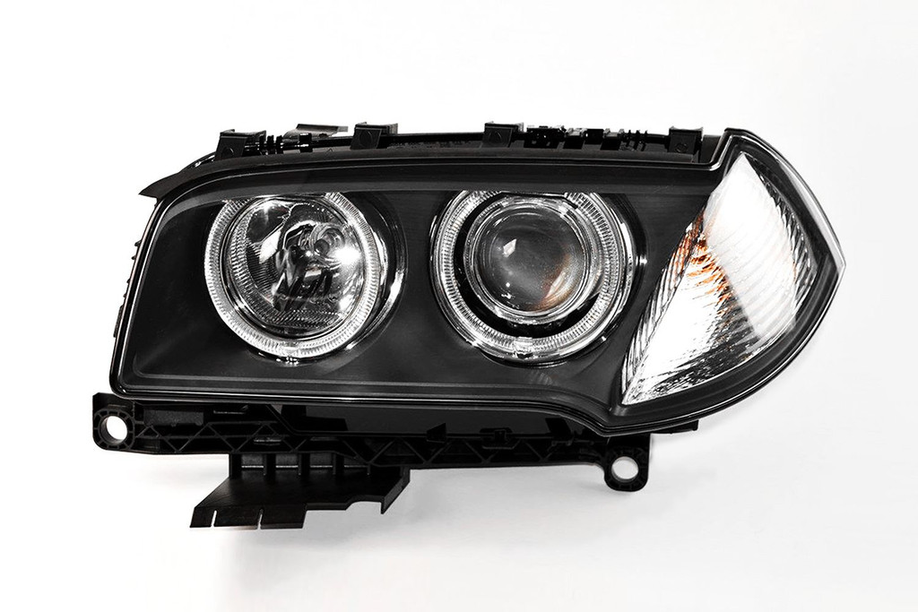 Headlight left xenon BMW X3 E83 06-10