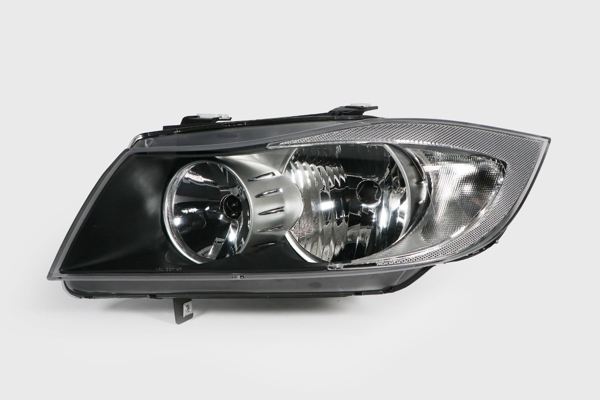 Headlight black inner left BMW 3 Series E90 E91 05-08