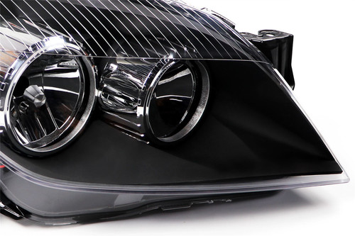 Headlight right black Vauxhall Astra H 04-07