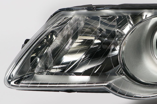Headlight left chrome VW Passat 3C 05-10 Valeo