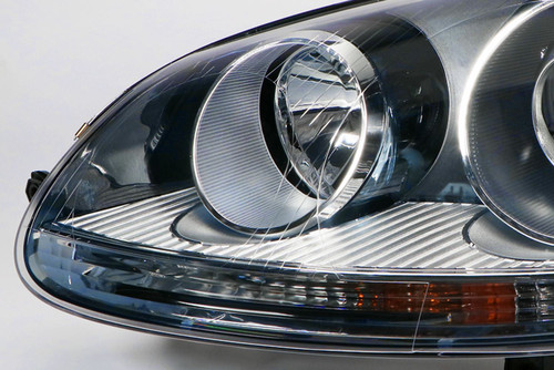Headlight left xenon VW Golf MK5 03-09