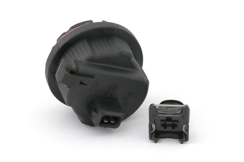 Headlight dust cap with plug