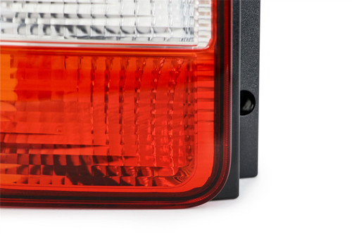 Rear light left clear VW Transporter T5 Caravelle 03-15 2 door OEM Hella