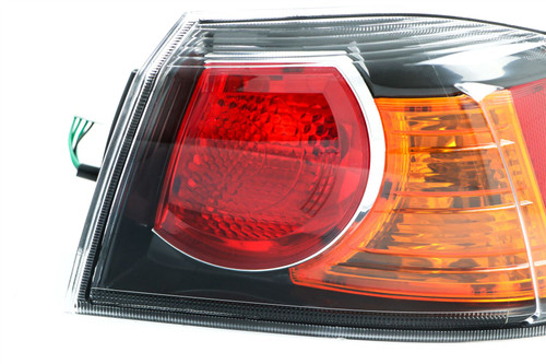 Rear light right black Mitsubishi Lancer 10- Saloon