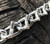 Twisted Link/V-Bar Boron Alloy with Cams