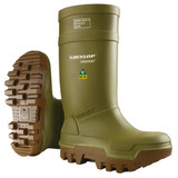 A heavyweight-duty Dunlop Purofort Thermo+ full-safety boot in olive-green polyurethane, featuring a steel toe and steel midsole for impact and penetration protection. It boasts a thick brown self-cleaning outsole with SRC-rated slip resistance, designed to retain heat and provide superior traction in extreme cold conditions