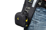 Tape measure holster on worker's waist.