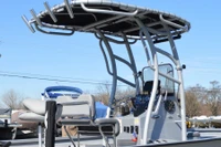 Zoomed in photo of the SG900 boat t-top model shows thicker diameter 2.5" leg sections and more tubing for holding on.