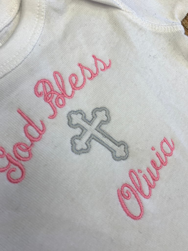 Pink Christening God Bless Onesie, expertly embroidered by Wicked Stitches Gifts