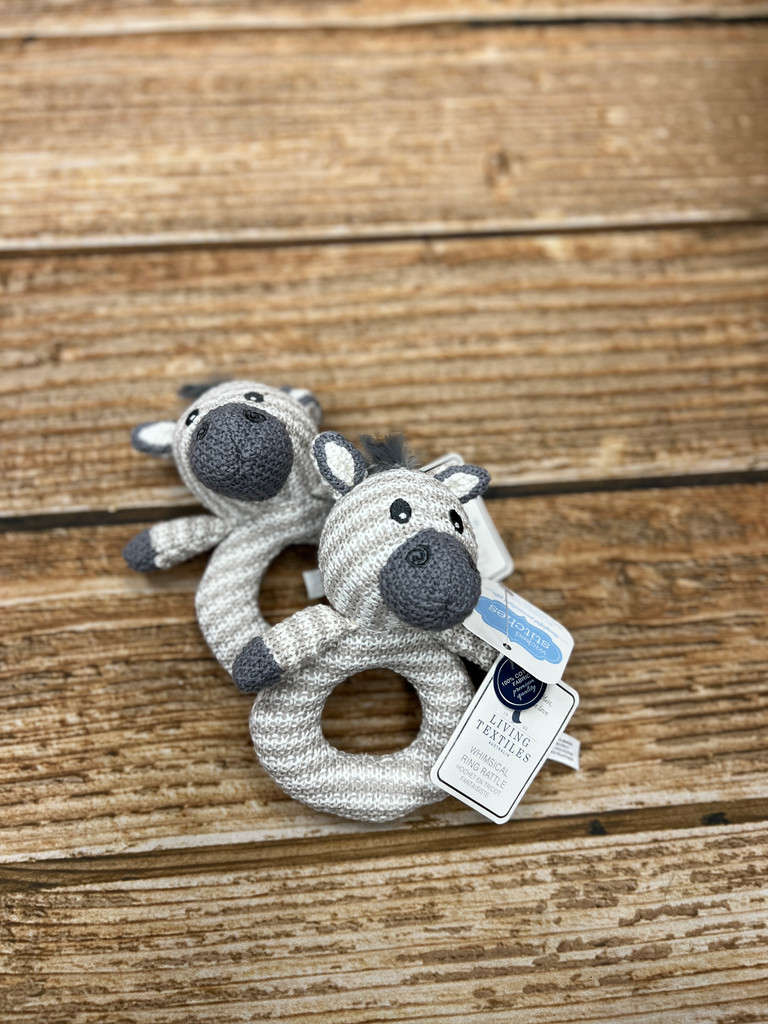 Cute little zebra for the baby...soothing rattle sound - easy care and easy to grab!  Wicked Stitches Gifts.
