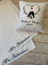 Pair the Lovebirds pillow with embroidered pillowcases to make a great wedding gift.