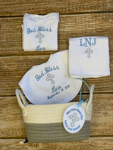Make a great christening gift!  Christening God bless bib, burp cloth and onesie with a gift tag in a cotton storage basket.
