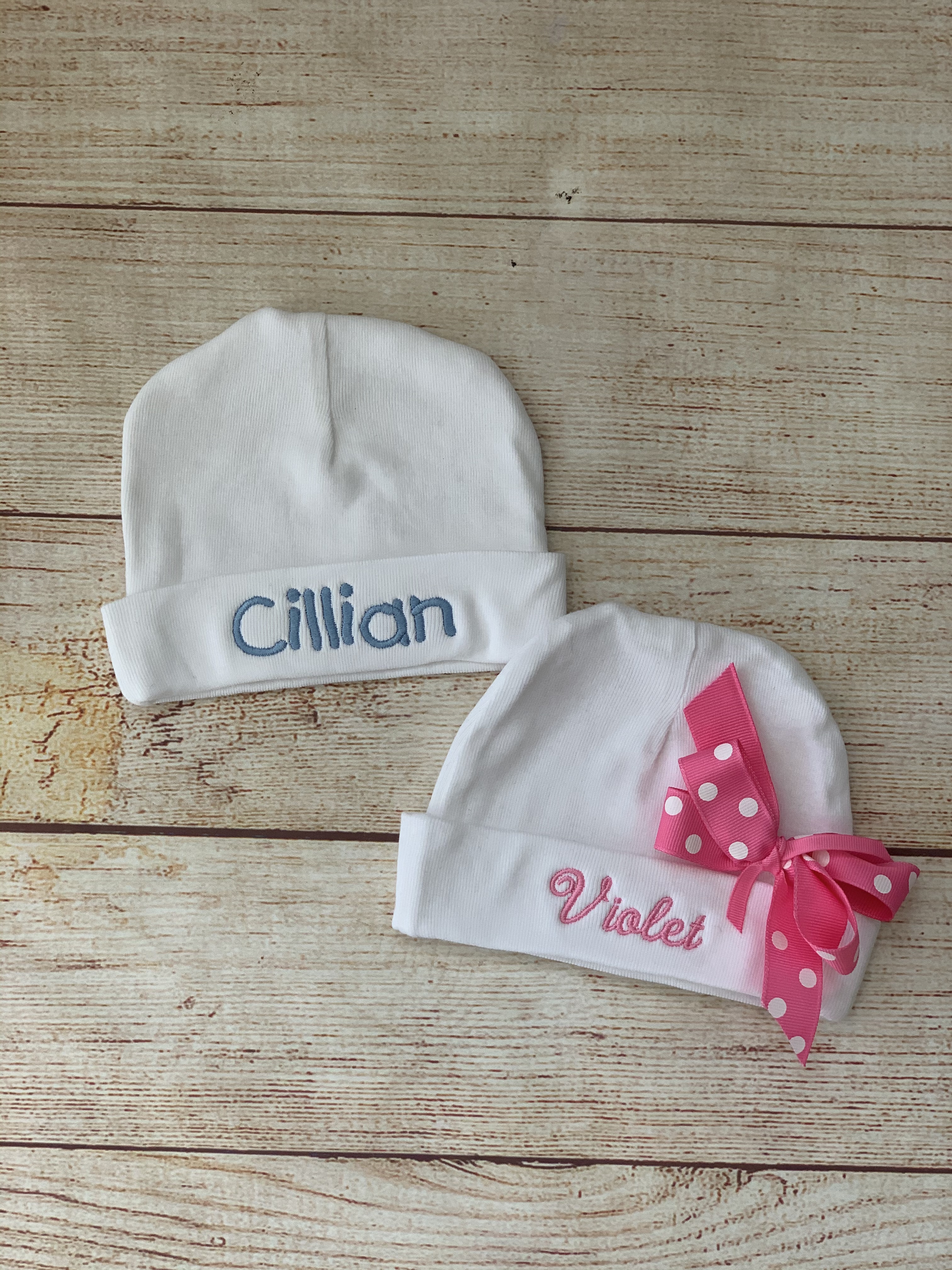 Embroidered baby name hats by Wicked Stitches Gifts.  Cotton jersey infant cap personalized with baby's name.