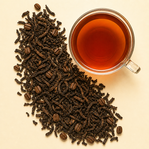 A bold and cozy way to wake up your morning. This rich blend brings together the smooth, earthy character of pu-erh tea with the roasted depth of whole coffee beans and a soft touch of creamy vanilla. The result is a warm, full-bodied cup with a coffeehouse feel, but with the layered complexity of tea.

Smooth, satisfying, and gently decadent, this blend is a wonderful choice for coffee lovers who enjoy exploring tea — or tea lovers who want a little coffee-inspired comfort in their cup. Add a splash of milk or creamer for an extra creamy treat.

Caffeine Level: High
Steeping Instructions: Steep at 180°F for 3–5 minutes

Ingredients: Pu-erh tea, Monobamba washed whole bean coffee, coffee flavor, natural vanilla flavor.