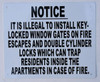 IT IS ILLEGAL TO INSTALL KEY- LOCKED WINDOW GATES ON FIRE ESCAPES AND DOUBLE CYLINDER   SIGN