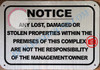 NOTICE ANY LOST DAMAGED OR STOLEN PROPERTIES WITHIN THE PREMISES OF THIS COMPLEX ARE NOT THE RESPONSIBILITY OF THE MANAGEMENT OR OWNER  SIGNAGE