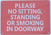 NO SITTING, NO STANDING, NO SMOKING IN THE DOORWAY Signage