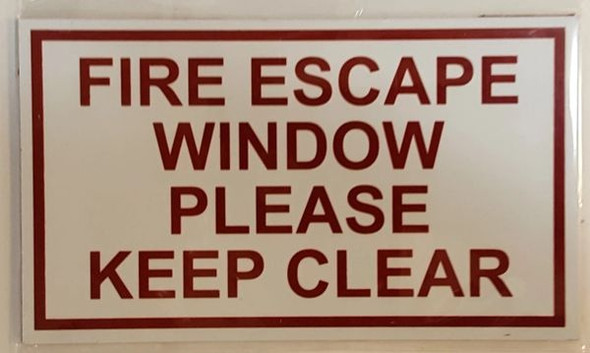 FIRE ESCAPE WINDOW PLEASE KEEP CLEAR SIGN