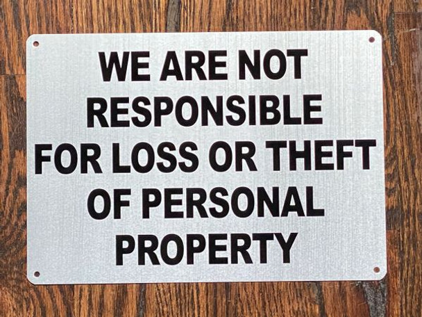 WE ARE NOT RESPONSIBLE FOR LOSS OR THEFT OF PERSONAL PROPERTY  SIGN