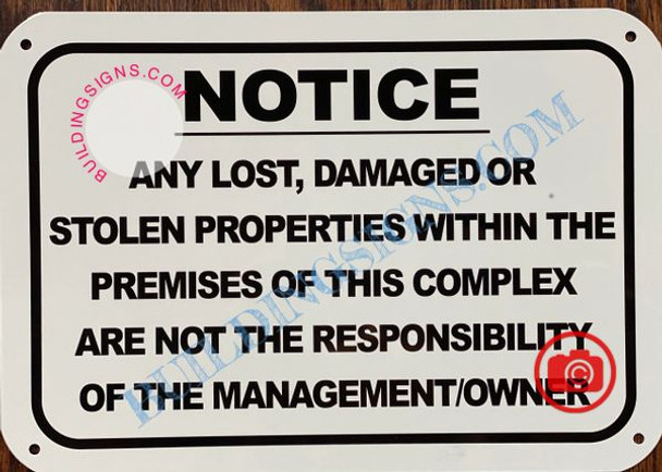 NOTICE ANY LOST DAMAGED OR STOLEN PROPERTIES WITHIN THE PREMISES OF THIS COMPLEX ARE NOT THE RESPONSIBILITY OF THE MANAGEMENT OR OWNER SIGN