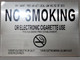 Sign NYC Smoke free Act   AGE "No Smoking or Electric cigarette Use" - to report violations of the law call 311 or visit NYC.GOV/Health  AGE