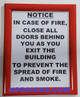 IN CASE OF FIRE CLOSE ALL DOORS BEHIND YOU AS YOU EXIT THE BUILDING  SIGNAGE