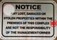 Sign NOTICE ANY LOST DAMAGED OR STOLEN PROPERTIES WITHIN THE PREMISES OF THIS COMPLEX ARE NOT THE RESPONSIBILITY OF THE MANAGEMENT OR OWNER  AGE