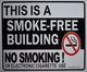 BUILDING SIGNAGE THIS IS A SMOKE FREE BUILDING NO SMOKING OR ELECTRONIC CIGARETTE USE UNDER PENALTY OF LAW