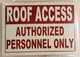 building sign ROOF ACCESS AUTHORIZED PERSONNEL ONLY