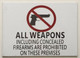SIGNAGE ALL WEAPONS INCLUDING CONCEALED FIREARMS ARE PROHIBITED ON THESE PREMISES  - PURE WHITE (ALUMINUM S)