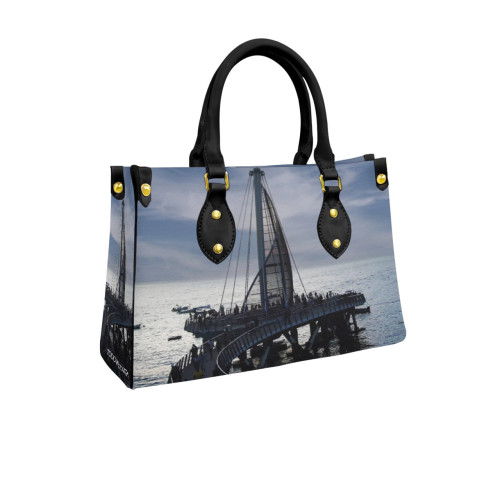 moonlit muelle de playa los muertos sand and water resistant tote bag