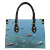 Stylish and beach-ready water & sand resistant tote printed with Island Harbour Anguilla. Roomy, durable, and designed for travel.