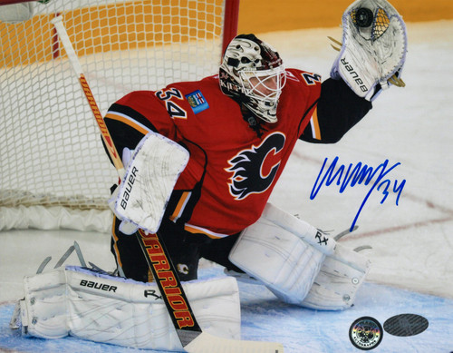 Miikka Kiprusoff Calgary Flames Autographed Glove Save 8x10 Photo Miikka Kiprusoff Calgary Flames Autographed Glove Save 8x10 Photo